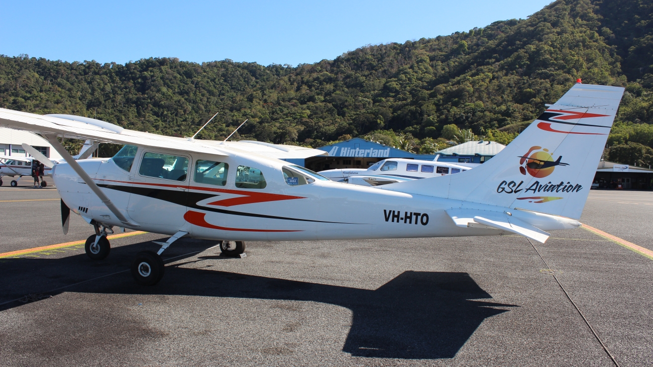 Cessna 206 at Cairns Airport, ready to depart on a scenic flight